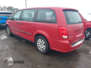 2014 Dodge Grand Caravan American Value with VIN 2C4RDGBG0ER452719, listed as a IAAI auction lot 41547145 with 151,636 mi miles and . Bid and sale history available at DreamBid. Image 3.