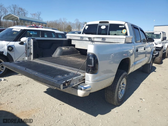 2004 Dodge Dakota SLT with VIN 1D7HL48N04S651386, listed as a Copart auction lot 46568045 with 216574 miles and Salvage Title. Bid and sale history available at carsss.com. Image 3.