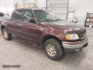 2001 Ford F-150 SuperCrew XLT with VIN 1FTRW08L51KE26356, listed as a IAAI auction lot 41011838 with 1 mi miles. Bid and sale history available at carsss.com. Image 1.