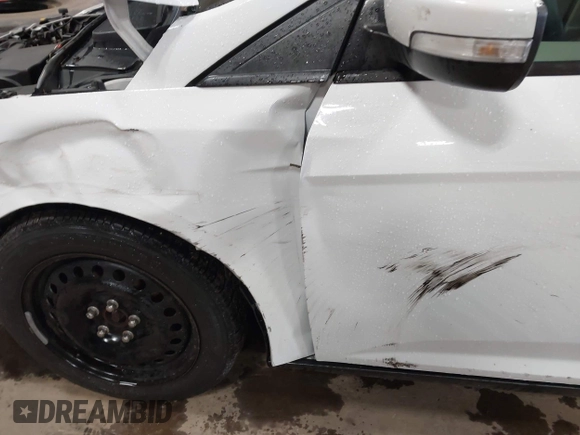 2012 Ford Focus SE с VIN 1FAHP3F21CL301085, выставлен на аукционе IAAI как лот 42321328 с пробегом 157 818 миль миль и . История ставок и продаж доступна на DreamBid. Изображение 6.
