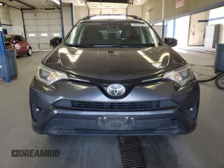 2018 Toyota RAV4 LE with VIN JTMBFREV9JJ743672, listed as a Copart auction lot 62510955 with 141,971 mi miles and Salvage title. Bid and sale history available at DreamBid. Image 5.
