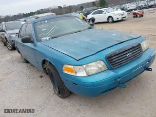 2000 Ford Crown Victoria Police Pkg Police Interceptor with VIN 2FAFP71W4YX136846, listed as a IAAI auction lot 41715363 with 335,956 mi miles. Bid and sale history available at carsss.com. Image 1.