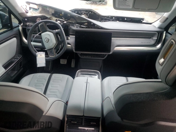 2023 Rivian R1S Launch Edition with VIN 7PDSGABL9PN006743, listed as a Copart auction lot 87275114 with Not Provided miles and Salvage Title. Bid and sale history available at DreamBid. Image 8.