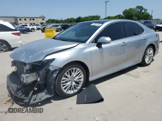 2018 Toyota Camry LE with VIN 4T1B11HK8JU075620, listed as a Copart auction lot 55587085 with 76,423 mi miles and Salvage title. Bid and sale history available at DreamBid. Image 1.