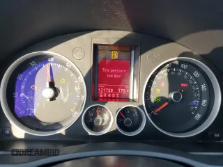 2009 Volkswagen GTI z VIN WVWHV71K89W101309, wystawiony jako Copart lot #70181114 z przebiegiem 121 728 mil mil oraz Szkoda całkowita • Salvage title. Historia ofert i sprzedaży dostępna na DreamBid. Obrazek 9.