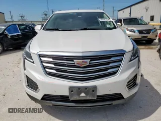 2018 Cadillac XT5 Premium Luxury AWD z VIN 1GYKNFRS7JZ239389, wystawiony jako Copart lot #56503575 z przebiegiem 137 222 mil mil oraz Szkoda całkowita • Salvage title. Historia ofert i sprzedaży dostępna na DreamBid. Obrazek 5.