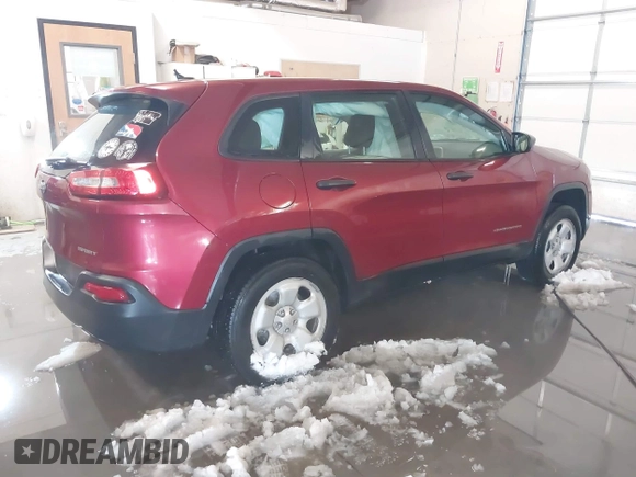 2014 Jeep Cherokee Sport with VIN 1C4PJMABXEW125420, listed as a IAAI auction lot 41573107 with 125,546 mi miles. Bid and sale history available at carsss.com. Image 4.