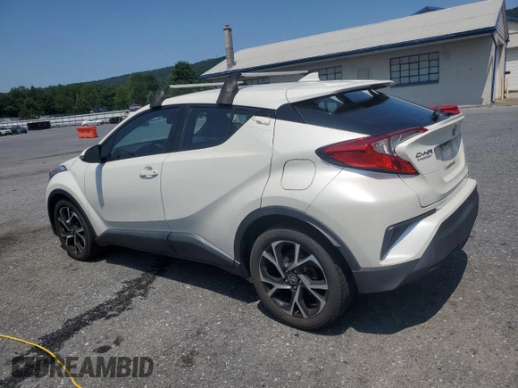 2018 Toyota C-HR XLE with VIN NMTKHMBX6JR027395, listed as a Copart auction lot 63071605 with 124,293 mi miles and Clean title. Bid and sale history available at DreamBid. Image 2.