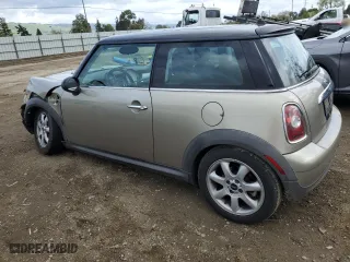 2009 MINI Cooper Hardtop with VIN WMWMF33559TW70189, listed as a Copart auction lot 51461365 with 146,700 mi miles and Salvage Title. Bid and sale history available at carsss.com. Image 2.