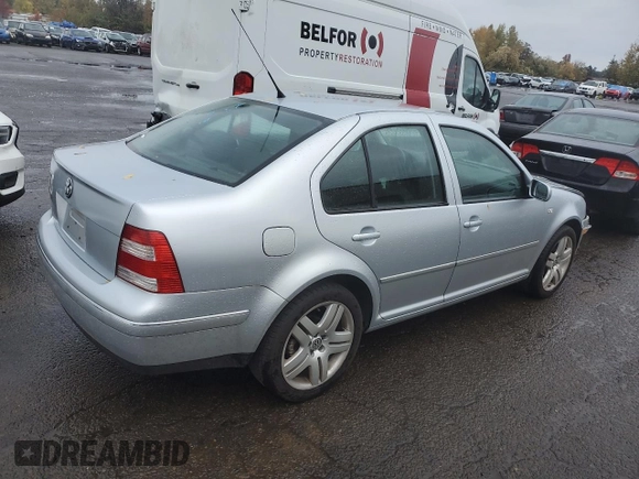 2004 Volkswagen Jetta GL z VIN 3VWRK69M54M030184, wystawiony jako Copart lot #77764124 z przebiegiem 97 634 mil mil oraz Szkoda całkowita • Salvage title. Historia ofert i sprzedaży dostępna na DreamBid. Obrazek 3.