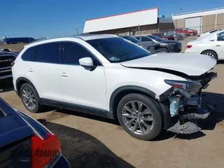 2018 Mazda CX-9 Grand Touring with VIN JM3TCADY6J0229768, listed as a IAAI auction lot 41724072 with 80,918 mi miles and . Bid and sale history available at DreamBid. Image 14.