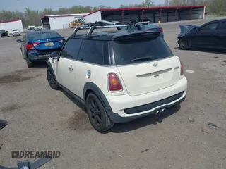 2007 MINI Hardtop S with VIN WMWMF73547TV31403, listed as a IAAI auction lot 42066433 with 156,730 mi miles and . Bid and sale history available at DreamBid. Image 3.