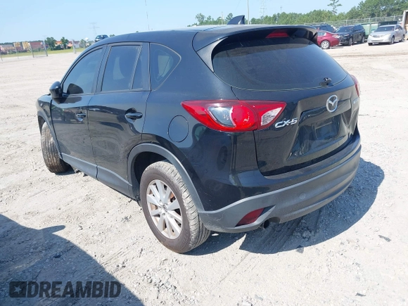 2014 Mazda CX-5 Sport z VIN JM3KE2BE2E0325715, wystawiony jako IAAI lot #42683243 z przebiegiem 262 005 mil mil oraz . Historia ofert i sprzedaży dostępna na DreamBid. Obrazek 3.