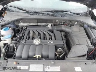 2013 Volkswagen Passat SEL Premium with VIN 1VWCM7A35DC061462, listed as a IAAI auction lot 41767171 with 163,708 mi miles. Bid and sale history available at carsss.com. Image 10.