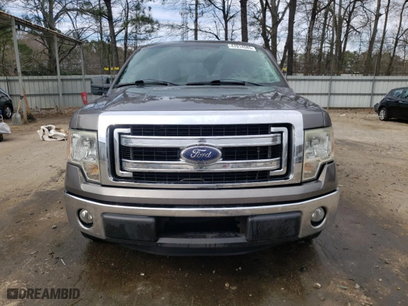 2013 Ford F-150 XL with VIN 1FTFW1CF6DKE99055, listed as a Copart auction lot 47014585 with 169,115 mi miles and Salvage Title. Bid and sale history available at carsss.com. Image 5.