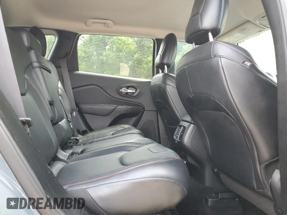 2014 Jeep Cherokee Trailhawk z VIN 1C4PJMBS4EW156550, wystawiony jako Copart lot #56870165 z przebiegiem 100 184 mil mil oraz Szkoda całkowita • Salvage title. Historia ofert i sprzedaży dostępna na DreamBid. Obrazek 11.