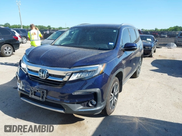 2020 Honda Pilot Elite with VIN 5FNYF6H02LB054348, listed as a IAAI auction lot 42302525 with 43,916 mi miles and . Bid and sale history available at DreamBid. Image 17.