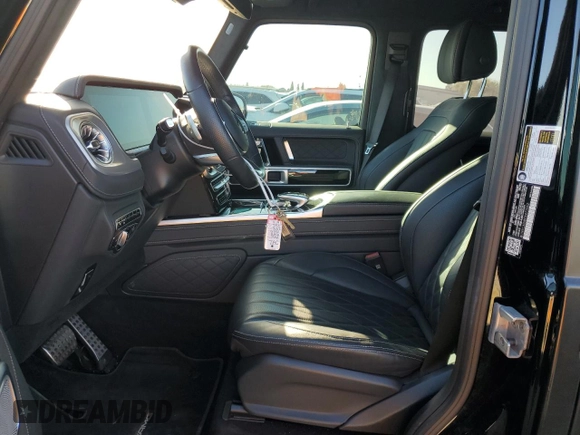 2023 Mercedes-Benz G 550 with VIN W1NYC6BJ8PX477062, listed as a Copart auction lot 46707575 with 20,232 mi miles and Salvage Title. Bid and sale history available at DreamBid. Image 7.