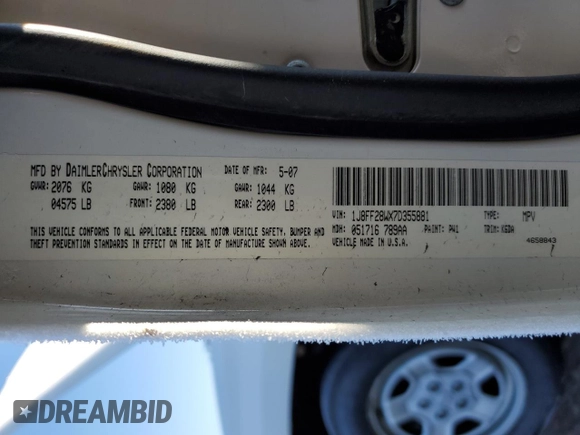 2007 Jeep Patriot Sport with VIN 1J8FF28WX7D355881, listed as a Copart auction lot 82766473 with 120,519 mi miles and Salvage Title. Bid and sale history available at DreamBid. Image 14.