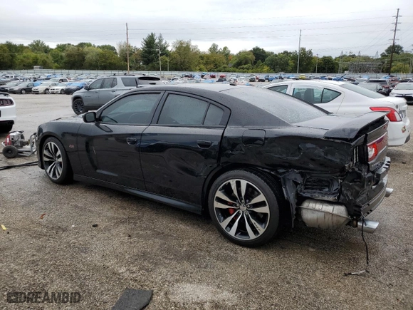 2012 Dodge Charger SRT8 with VIN 2C3CDXEJ8CH217246, listed as a Copart auction lot 71079334 with 105,528 mi miles and Salvage Title. Bid and sale history available at carsss.com. Image 2.