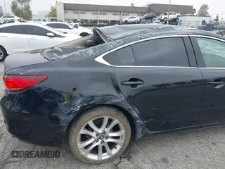 2014 Mazda 6 i Touring with VIN JM1GJ1T6XE1162480, listed as a IAAI auction lot 42150777 with 148,113 mi miles and . Bid and sale history available at DreamBid. Image 12.