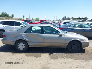1998 Toyota Camry LE z VIN 4T1BG22K8WU216321, wystawiony jako IAAI lot #42316977 z przebiegiem 227 166 mil mil oraz . Historia ofert i sprzedaży dostępna na DreamBid. Obrazek 14.
