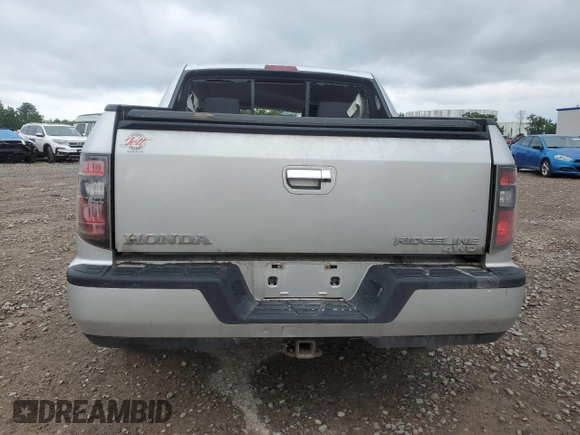 2013 Honda Ridgeline Sport z VIN 5FPYK1F75DB011503, wystawiony jako Copart lot #62094665 z przebiegiem Nie podano mil oraz Szkoda całkowita • Salvage title. Historia ofert i sprzedaży dostępna na DreamBid. Obrazek 6.