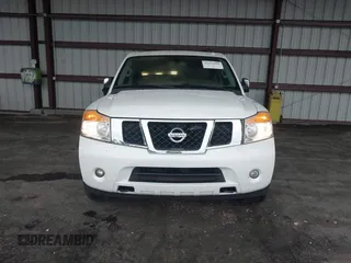 2015 Nissan Armada SV z VIN 5N1BA0ND4FN622772, wystawiony jako IAAI lot #42233400 z przebiegiem 145 087 mil mil oraz . Historia ofert i sprzedaży dostępna na DreamBid. Obrazek 12.