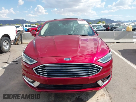 2017 Ford Fusion Titanium with VIN 3FA6P0K98HR207447, listed as a IAAI auction lot 42422213 with 59,549 mi miles and . Bid and sale history available at DreamBid. Image 12.