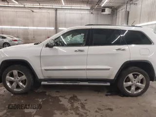 2013 Jeep Grand Cherokee Overland with VIN 1C4RJFCG7DC581808, listed as a IAAI auction lot 41242922 with 187,442 mi miles. Bid and sale history available at carsss.com. Image 15.
