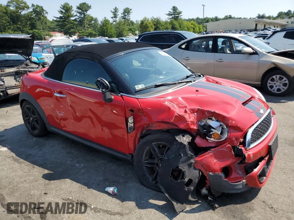 2013 MINI Roadster S z VIN WMWSY3C58DT594039, wystawiony jako Copart lot #65833804 z przebiegiem Nie podano mil oraz Szkody całkowita. Historia ofert i sprzedaży dostępna na DreamBid. Obrazek 4.