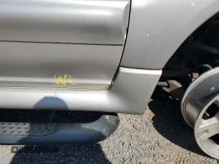 2004 Ford Explorer Sport Trac XLS z VIN 1FMDU77K24UA03885, wystawiony jako Copart lot #75434684 z przebiegiem Nie podano mil oraz Szkoda całkowita • Salvage title. Historia ofert i sprzedaży dostępna na DreamBid. Obrazek 12.