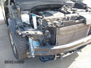 2014 Hyundai Santa Fe with VIN 5XYZUDLB9EG187420, listed as a IAAI auction lot 42369989 with 181,713 mi miles and . Bid and sale history available at DreamBid. Image 19.