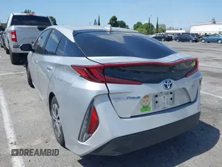 2021 Toyota Prius LE with VIN JTDKAMFP1M3180370, listed as a IAAI auction lot 41928512 with 83,249 mi miles and . Bid and sale history available at DreamBid. Image 3.