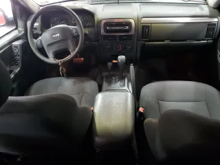 2002 Jeep Grand Cherokee Laredo with VIN 1J4GW48S22C164159, listed as a Copart auction lot 89146265 with 135,087 mi miles and Salvage Title. Bid and sale history available at carsss.com. Image 8.