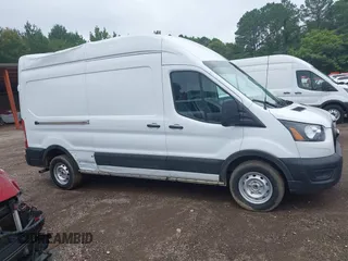 2023 Ford Transit Cargo with VIN 1FTBR1X8XPKA13479, listed as a IAAI auction lot 42608306 with 61,767 mi miles and . Bid and sale history available at DreamBid. Image 13.