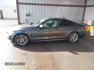 2015 BMW 4 Series 435i with VIN WBA3R1C59FK194649, listed as a IAAI auction lot 41565414 with 123,702 mi miles and . Bid and sale history available at DreamBid. Image 14.