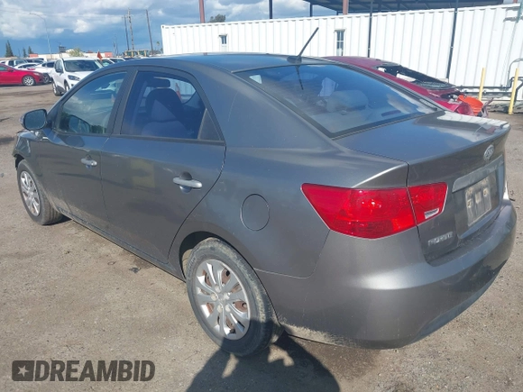 2010 Kia Forte EX with VIN KNAFU4A28A5229372, listed as a IAAI auction lot 41911118 with 166,084 mi miles. Bid and sale history available at carsss.com. Image 3.