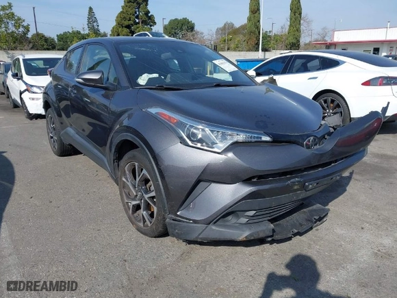 2019 Toyota C-HR XLE with VIN NMTKHMBX0KR082149, listed as a IAAI auction lot 41601379 with 79,765 mi miles. Bid and sale history available at carsss.com. Image 1.