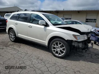 2013 Dodge Journey Crew with VIN 3C4PDCCG3DT643061, listed as a Copart auction lot 67518754 with 154,227 mi miles and Salvage title. Bid and sale history available at DreamBid. Image 4.