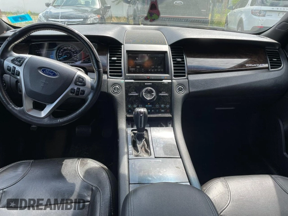 2015 Ford Taurus Limited with VIN 1FAHP2F80FG176642, listed as a Copart auction lot 64948025 with 159,916 mi miles and Clean title. Bid and sale history available at DreamBid. Image 7.