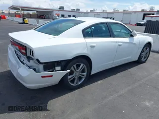 2014 Dodge Charger RT Plus with VIN 2C3CDXDT1EH320384, listed as a IAAI auction lot 41953887 with 79,126 mi miles. Bid and sale history available at carsss.com. Image 4.