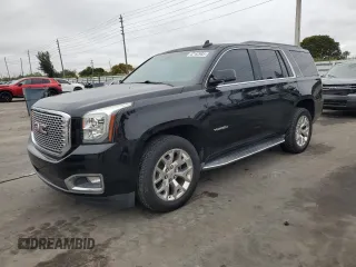 2015 GMC Yukon SLE with VIN 1GKS1AKC0FR684558, listed as a Copart auction lot 42162985 with 156,302 mi miles and Clean Title. Bid and sale history available at carsss.com. Image 1.