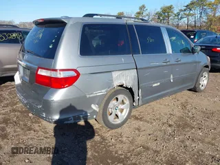 2006 Honda Odyssey TOURING with VIN 5FNRL38846B059685, listed as a IAAI auction lot 41831849 with 999,999 mi miles. Bid and sale history available at carsss.com. Image 4.