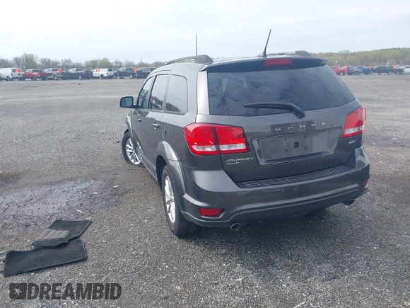 2017 Dodge Journey SXT with VIN 3C4PDDBG5HT618563, listed as a IAAI auction lot 42015188 with 104,747 mi miles and . Bid and sale history available at DreamBid. Image 3.