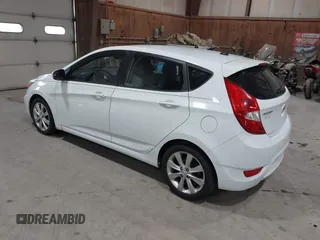 2014 Hyundai Accent SE z VIN KMHCU5AE4EU163402, wystawiony jako IAAI lot #41755872 z przebiegiem 161 017 mil mil oraz . Historia ofert i sprzedaży dostępna na DreamBid. Obrazek 3.