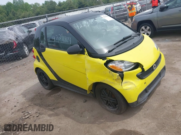 2013 Smart fortwo Pure with VIN WMEEJ3BA5DK663165, listed as a IAAI auction lot 42291804 with 105,074 mi miles and . Bid and sale history available at DreamBid. Image 1.