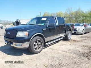 2005 Ford F-150 XLT with VIN 1FTRW12W65FB12867, listed as a IAAI auction lot 42143592 with 182,481 mi miles and . Bid and sale history available at DreamBid. Image 2.