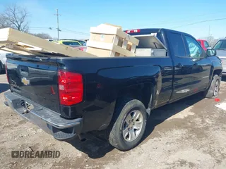 2015 Chevrolet Silverado 1500 LT with VIN 1GCRCREH3FZ206158, listed as a IAAI auction lot 41610695 with 182,692 mi miles. Bid and sale history available at carsss.com. Image 4.