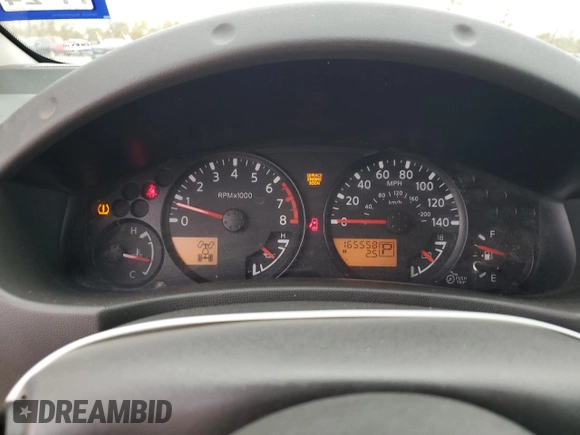 2009 Nissan Frontier SE with VIN 1N6AD06W69C400688, listed as a Copart auction lot 85140904 with 165,558 mi miles and Salvage title. Bid and sale history available at DreamBid. Image 9.